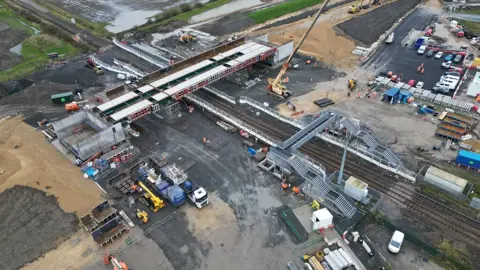 Northumberland County Council An aerial view of the construction of a road bridge over a railway line 