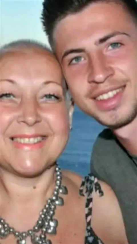 A selfie of a man and a woman.