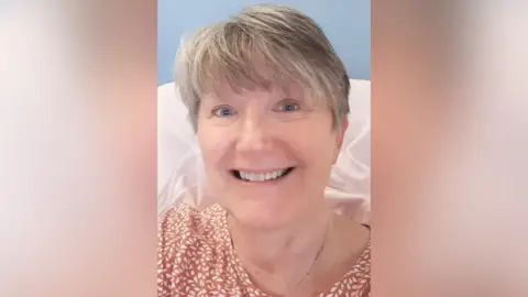 Wages and politics will dominate the news in 2024 28 Christine Campbell Christine Campbell smiles. She has short blonde gray hair and wears an orange and white patterned top.