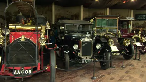 A line of vintage vehicles in the National Motor Museum