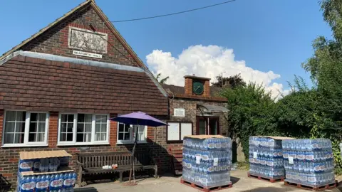 BBC Bottled water at a village hall in West Sussex