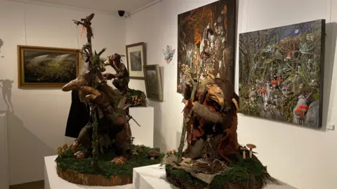 Fantasy-inspired works of art on display in the gallery