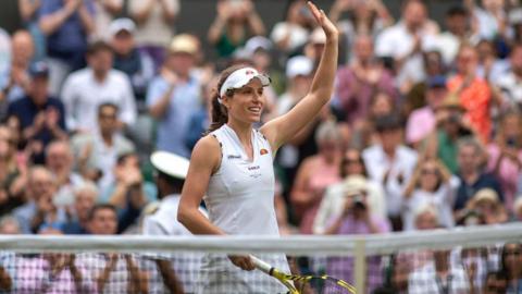 Johanna Konta waves to the crowd as she celebrates beating Petra Kvitova on Centre Court at Wimbledon
