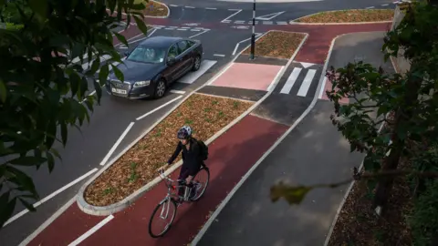 Getty Images Cyclist using the Dutch roundabout in Cambridge