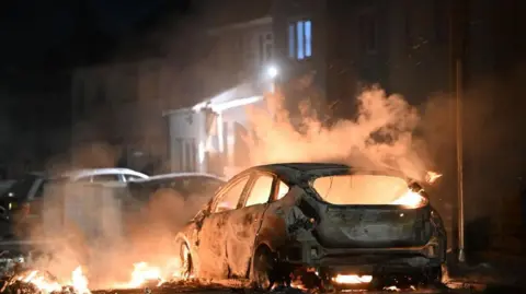 Getty Images Car in flames on residential street in Ely, Cardiff