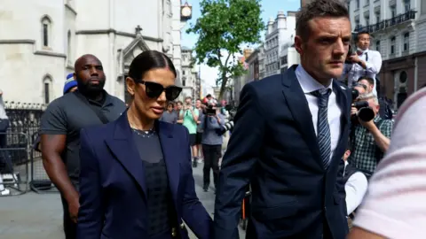 Reuters Rebekah Vardy left court early on Tuesday, with her husband Jamie