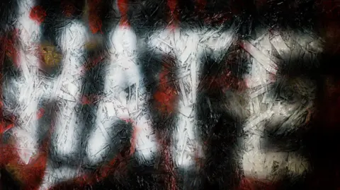 The word "hate" written on a wall. The letters are in white and appear on a red and black background. 