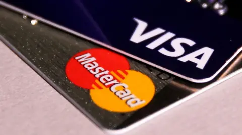 A stock photo of a close up of the corner of two credit cars. 