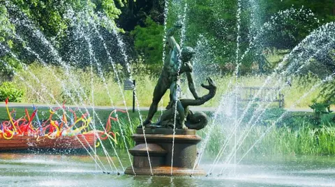 A general view of the sculpture of Hercules and writhing serpent Achelous at Kew Gardens on a fine day.