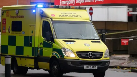 Getty Images Ambulance teams work in the Accident and Emergency zone of St Thomas' Hospital on December 19, 2022 in London, England. The NHS will experience strikes by both Nurses and ambulance workers this week. Army personnel are being used by the government to fill some of the gaps in the ambulance service as strikes will affect 10 trusts across the UK.