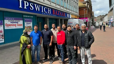 George King/BBC Ipswich Bazaar owners and workers