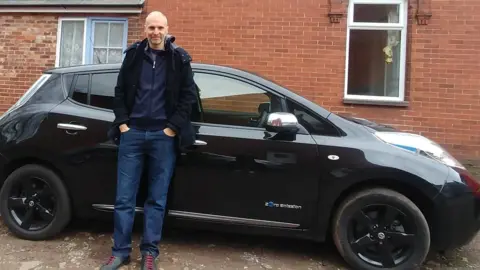 Alex Banks Alex Banks from Exeter drives an electric Nissan Leaf