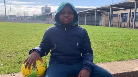 Malang, 12, a pupil at The City Academy