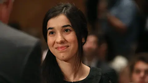 Getty Images Nadia Murad, (C), human rights activist, arrives at a Senate Homeland Security and Governmental Affairs Committee hearing on Capitol Hill, June 21, 2016 in Washington, DC.