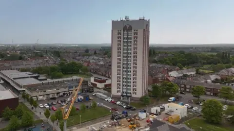Durham Court is a high-rise block of flats in Hebburn. It overlooks the town. The building is pink and cream.