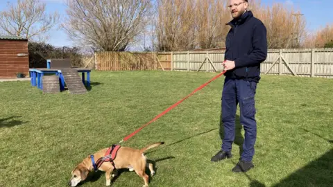 Charlie being walked by Andy