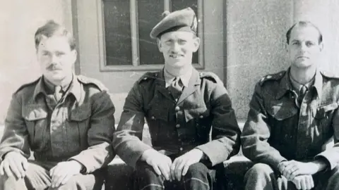 The Royal Scots Major John Errington (left), during his time as a prisoner of war in 1942