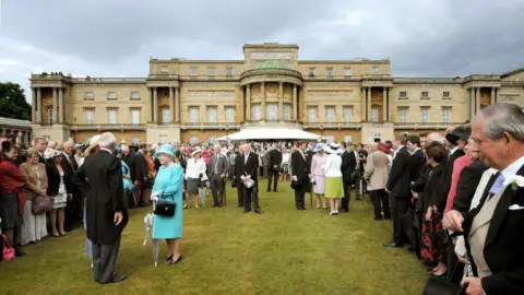 Getty Images Queen Elizabeth stood in the gardens of Buckingham Palace in 2009
