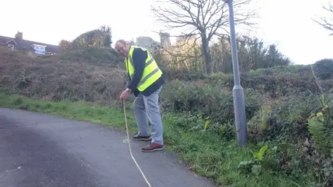 Gwyn Headley has been helping to measure the street