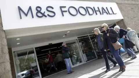 M&S Shoppers outside an M&S Foodhall store