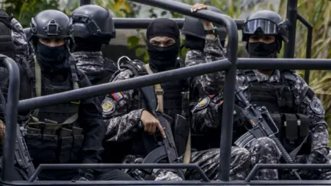 Getty Images SEBIN officers patrolling Caracas in January 2018