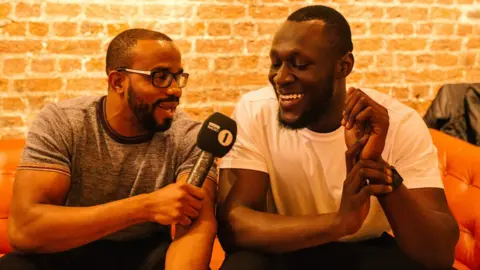 Azpictures Newsbeat reporter Nesta McGregor and Stormzy