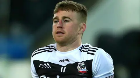 Paul Devlin shows his disappointment after Kilcoo's defeat at Croke Park