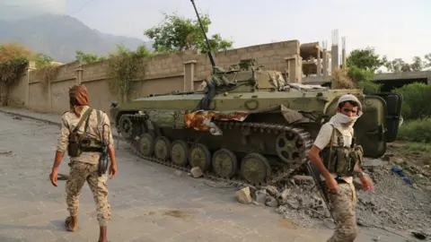 Reuters Pro-government fighter army troops walk in a position they retook from Houthi fighters near the Republican Palace in the north-western city of Taiz
