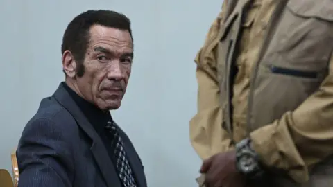 Former Botswana president Ian Khama sits in the Broadhurst Magistrate court in Gaborone on 13 September.