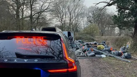 Warwickshire Police Police at the scene of flytipping