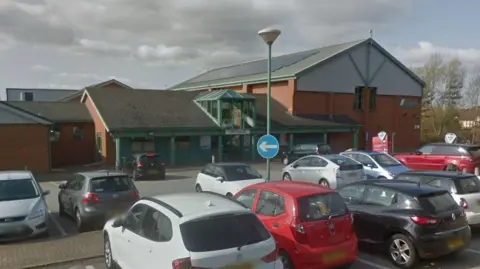 Google General view of Springwood Leisure Centre in Derby with cars in car park