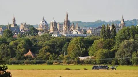 BBC The skyline of Oxford, showing various university colleges, churches and other buildings