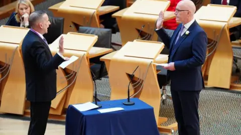 Man swearing in ceremony at Holyrood