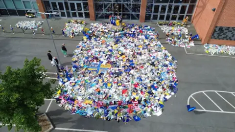 Shirts and flowers left outside Headingley Stadium