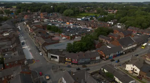 EPA/Shutterstock An aerial photograph taken with a drone of Ashton-in-Makerfield in Wigan