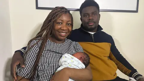 Corinne Wheatley/BBC Debby and Chris Minzele