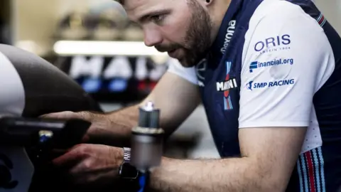 Williams F1 Jack working on Lance Stroll's car in Australia
