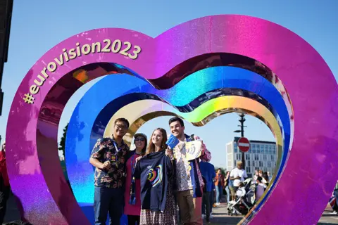 Dominic Lipinski / Getty Images Fans at the The Eurovision Song Contest