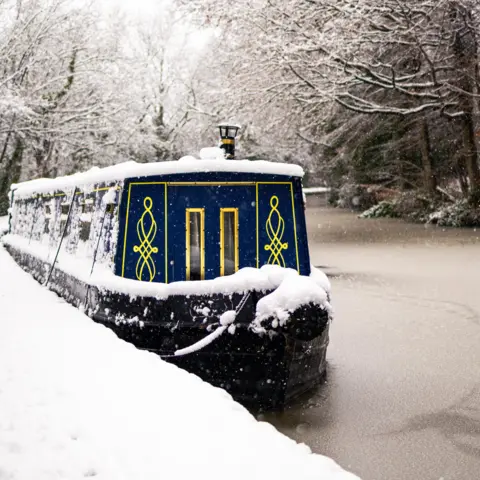 BBC Weather Watchers/Josh A snow-covered barge moored in a canal in Bingley, Bradford