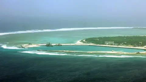 Getty Images This aerial view of the city of Sansha on an island in the disputed Paracel chain, which China now considers part of Hainan province. File photo