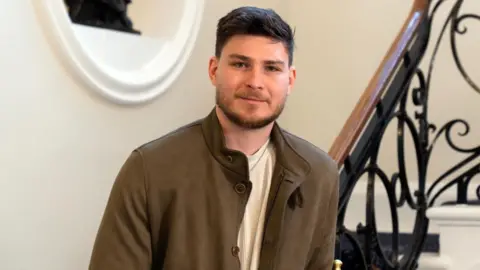 Lee Durant/BBC Head and shoulder photo of former Israeli hostage Sasha Troufanov