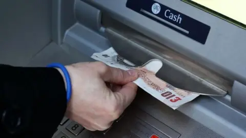 PA Money being taken out of an ATM