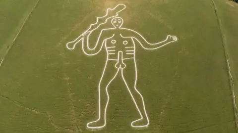 Cerne Abbas Giant - a hill figure with a white chalk outline. National Trust Images / John Millar