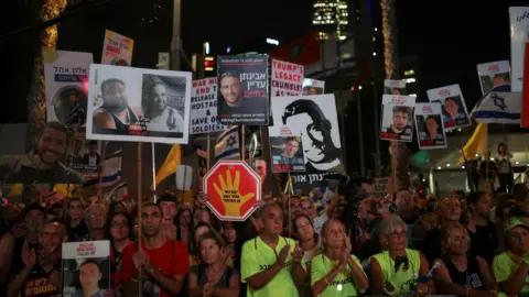 Reuters Demonstrators in Tel Aviv, Israel, take part in a rally calling for the return of all the Israeli hostages in Gaza and an end to the war (17 August 2025)