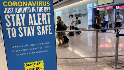 Reuters Sign at Heathrow arrivals