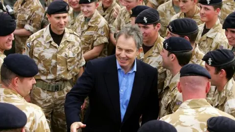 AFP Tony Blair in Iraq in December 2004