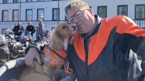 Stuart Lawson from Hartlepool with biker dog Jinx