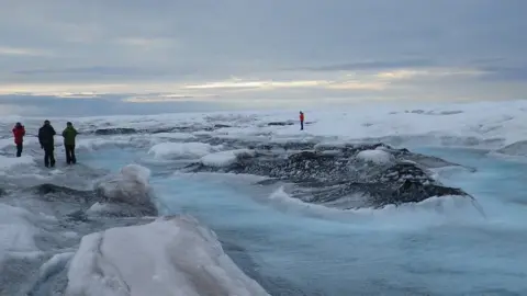 Aberystwyth University Some of the research team in the Dark Zone on the western edge of the Greenland Ice Sheet.