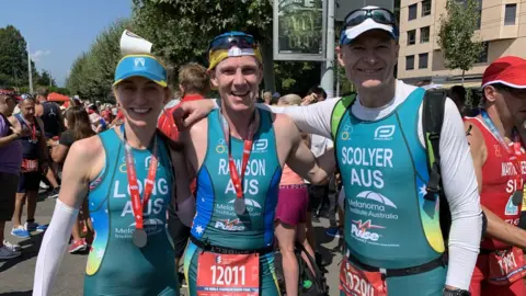 Melanoma Institute Australia Georgina Long (left) and Richard Scolyer (right) at a triathlon event