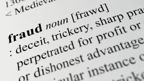 Getty Images close-up of definition of fraud